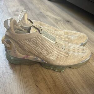 Nike women’s Tan Knit Slip-On Sneakers